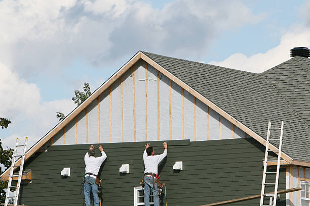 Professional Vinyl Siding technician working in Columbus, MN
